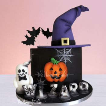halloween cake with a hat and a ghost