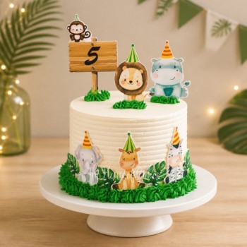 a cake with jungle animals on top