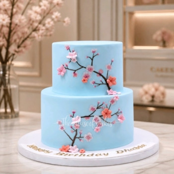 Light blue cake with flowers