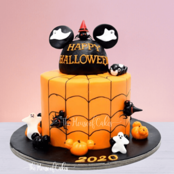 a cake with halloween decorations on it