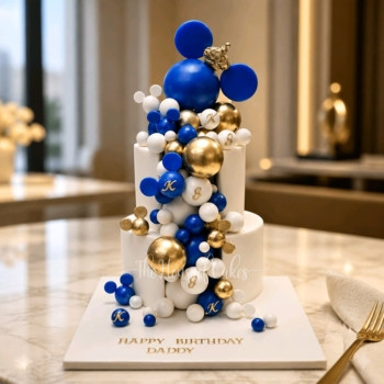 Cake with blue and gold balls