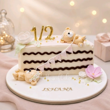Half birthday cake with teddy bears