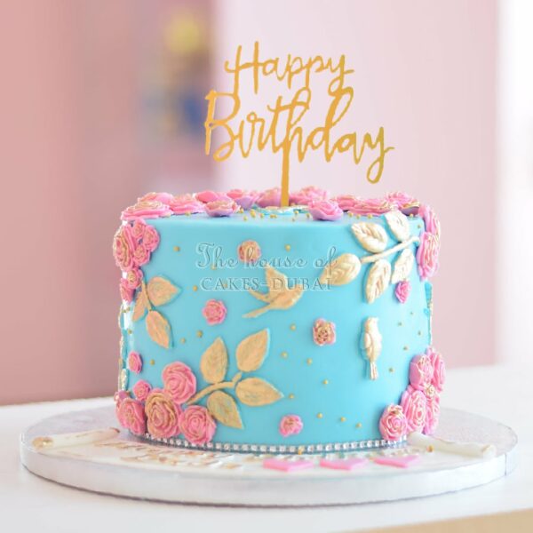 Blue cake with pink flowers