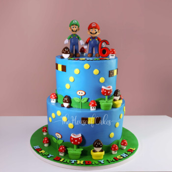 a blue cake with Super Mario characters on top