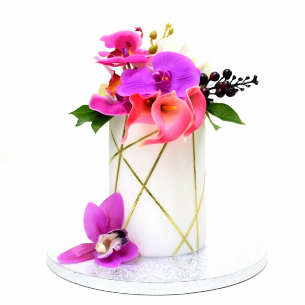 Tall trendy cake with flowers