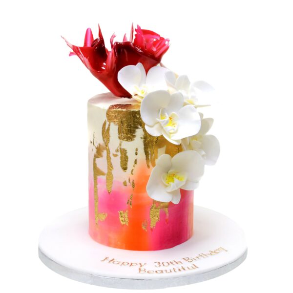 Trendy cake with orchids and pink sail