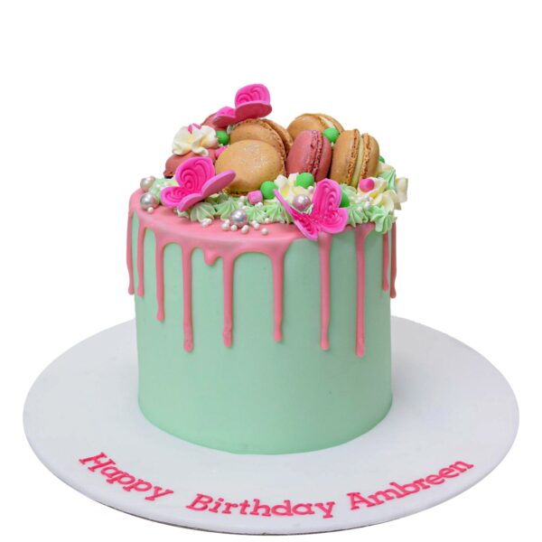 Pastel green cake with pink drip