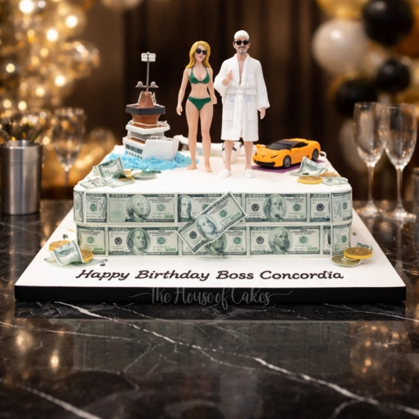 Customised cake with lady, man, yacht, plane, money and car