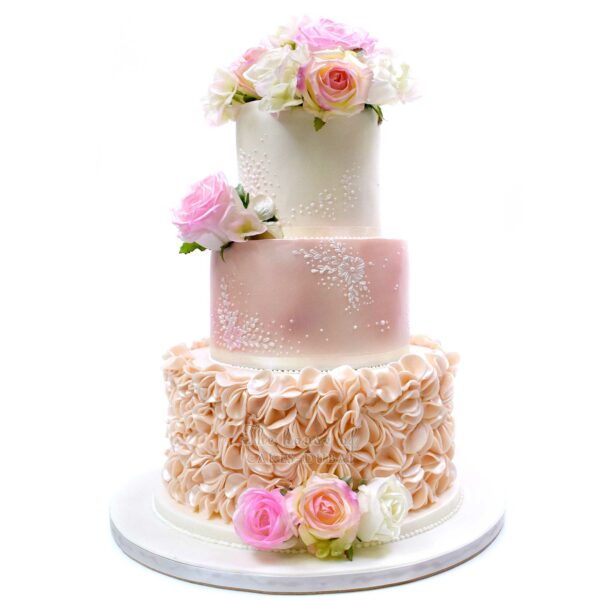 Pink and white cake with roses and ruffles