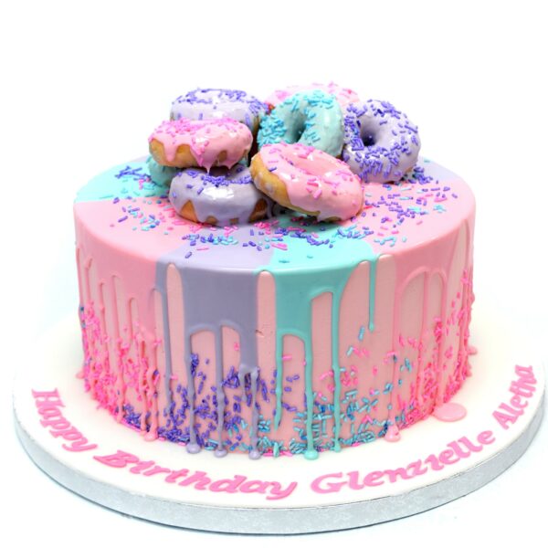 Cake with colourful doughnuts