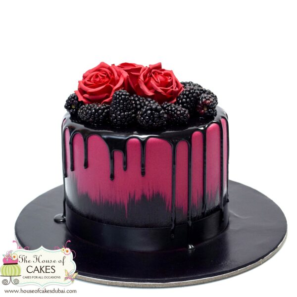 Blackberries roses and black drip cake