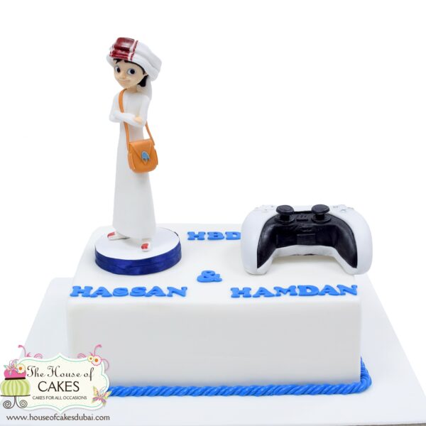 Arabic boy and PS 5 controller cake