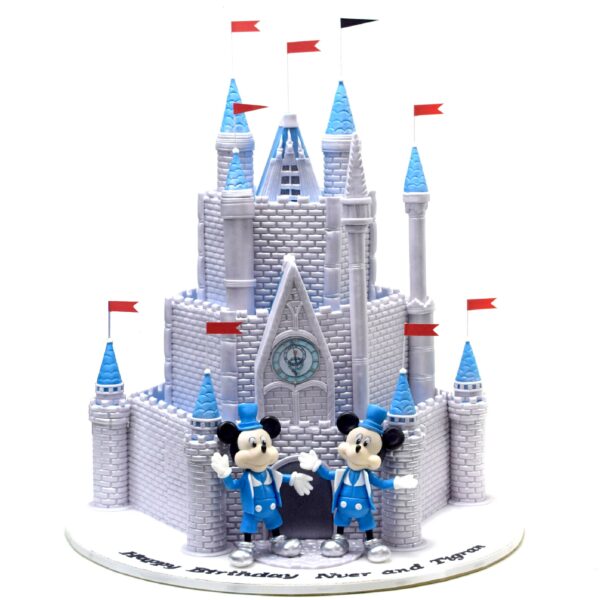 Disneyland Paris castle cake with Mickey and Minnie Mouse