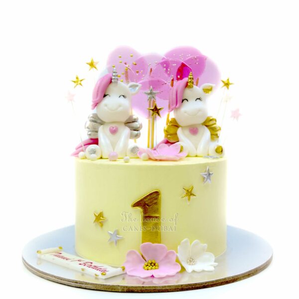 Twin unicorns cake