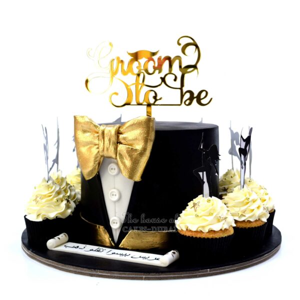 Groom to be tuxedo cake and cupcakes