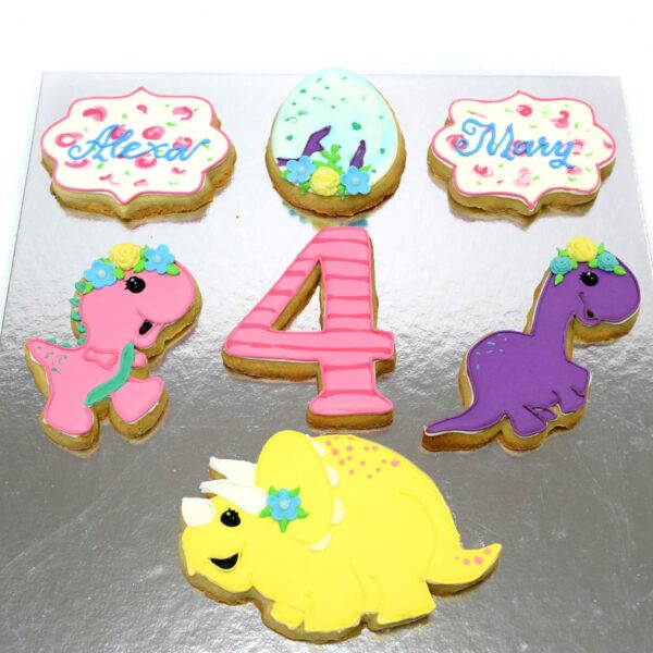 Cute dinosaurs and birthday cookies