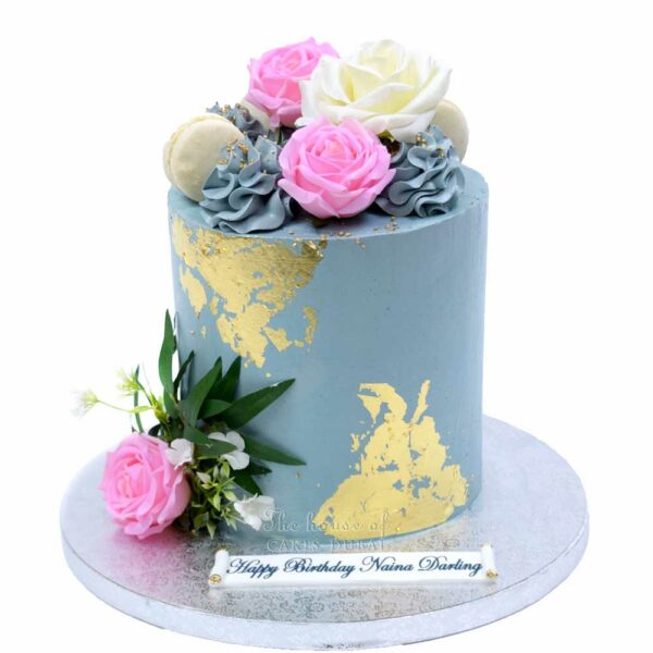 Grey and gold cake with flowers