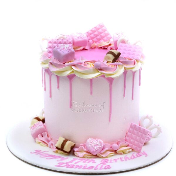 Pink drip pink candies cake