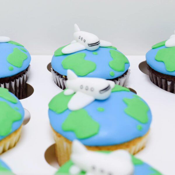 Globe and plane cupcakes