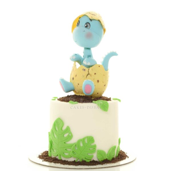 Cute dinosaur in egg cake