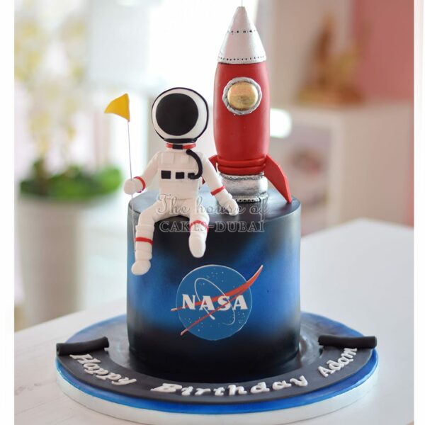 Love you to the moon and back astronaut and rocket cake