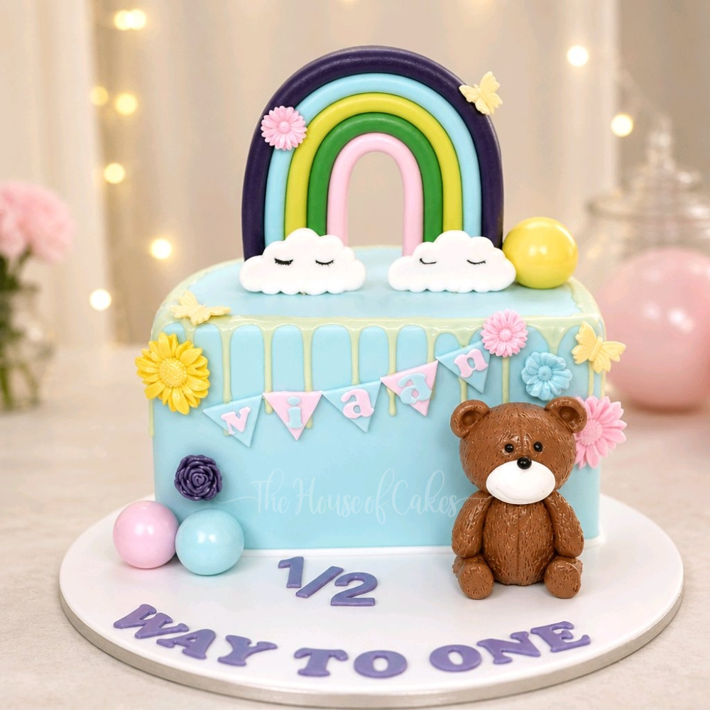 Bear Riff Raff Cake Half birthday cake with bear and rainbow - The House of Cakes Dubai