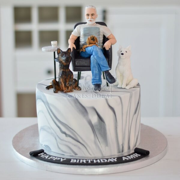 Man with dogs cake