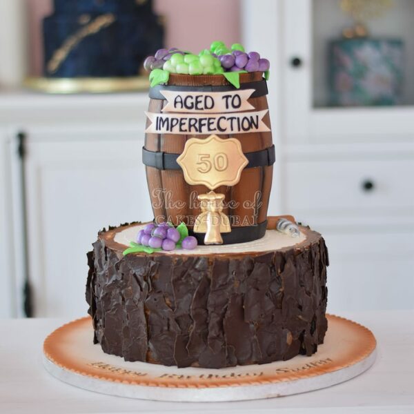 Aged to imperfection log and wine barrel cake