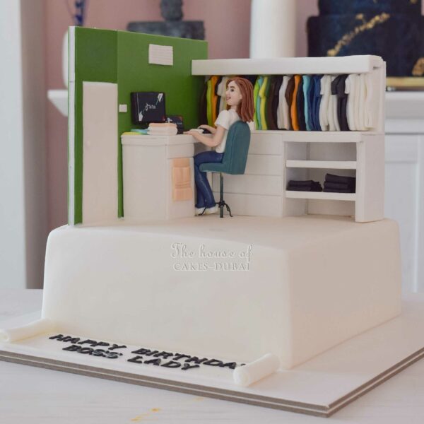 Cake with lady on desk and walk-in closet