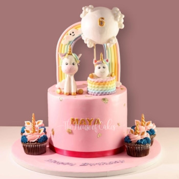 Unicorns and rainbow cake and cupcakes