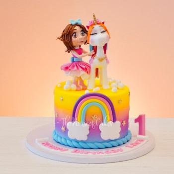 Girl and unicorn cake