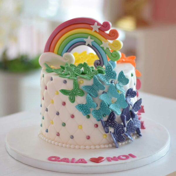 Butterflies and rainbow cake