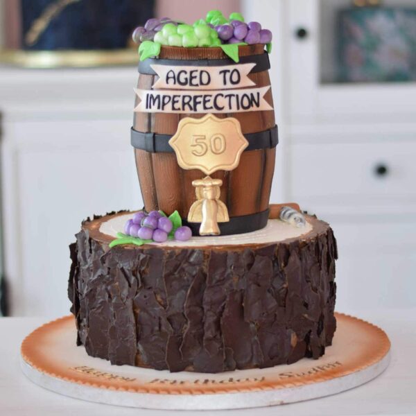 Aged to imperfection log and wine barrel cake