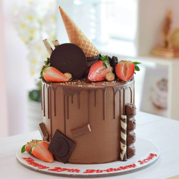 Chocolate strawberries and ice cream cone cake