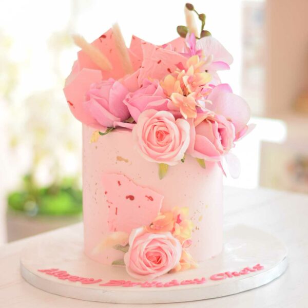 Pink cream cake with roses
