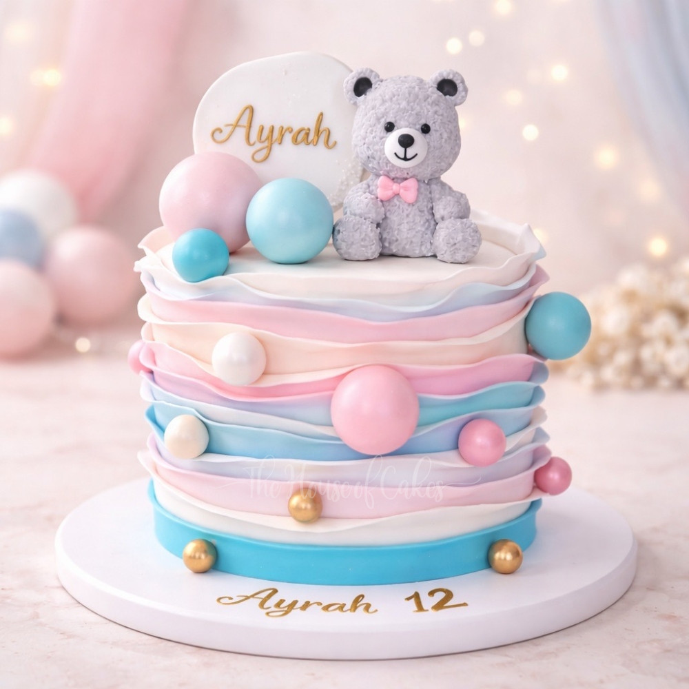 Teddy bear cake with pink and blue ruffles - The House of Cakes Dubai