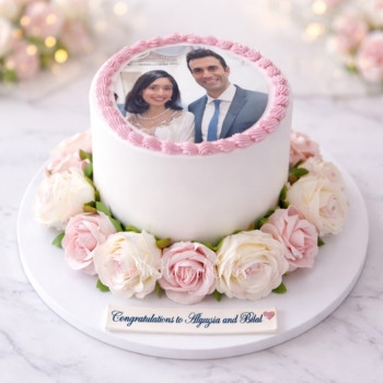 Anniversary cake with photo and roses