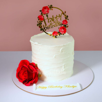 Simple elegant birthday cake with red rose