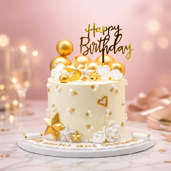 White and Gold Cake with Stars and Balls