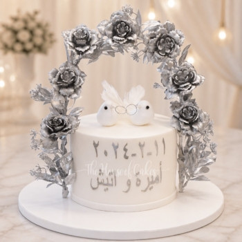 Love Birds Cake with Silver Roses Arch in Dubai