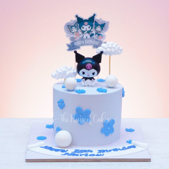 a white cake with blue flowers and Kuromi character on top