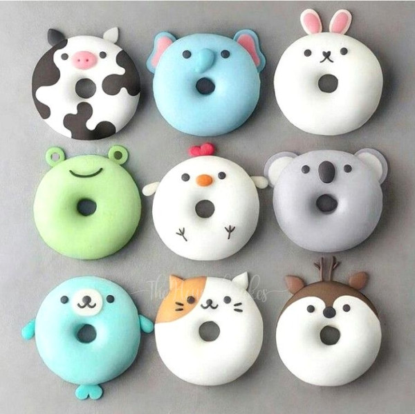 a group of donuts with animal faces