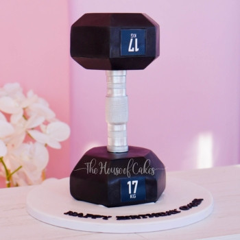 a black dumbbell cake