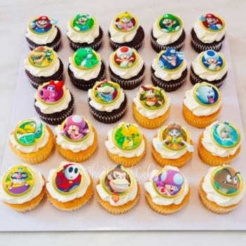 cupcakes with frosting and super mario printed characters