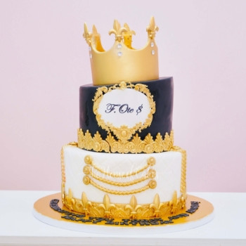 a cake with a golden crown on top