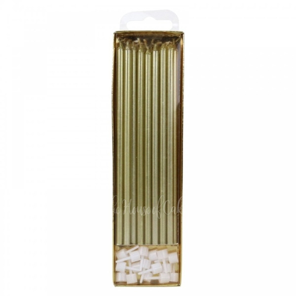 a box of gold colored candles