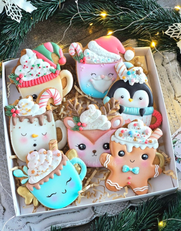 a box of decorated cookies for christmas