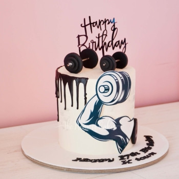 Muscle Madness weights lifting cake