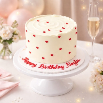 Cream cake with red hearts