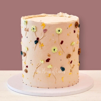 elegant beige cake with buttercream flowers